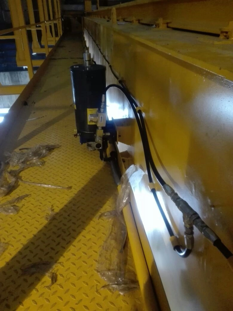 Система смазки боковой поверхности рельс моста и каретки мостового крана