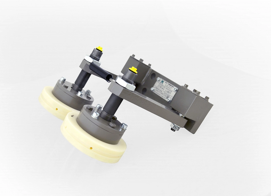 Система смазки боковой поверхности рельс моста и каретки мостового крана